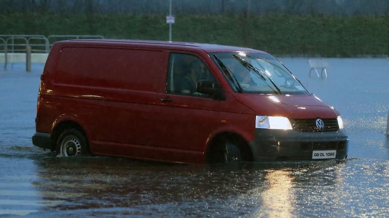 Roads were closed along the western seaboard as Storm Desmond caused road chaos, landslides and flooding. Photograph: Niall Carson/PA