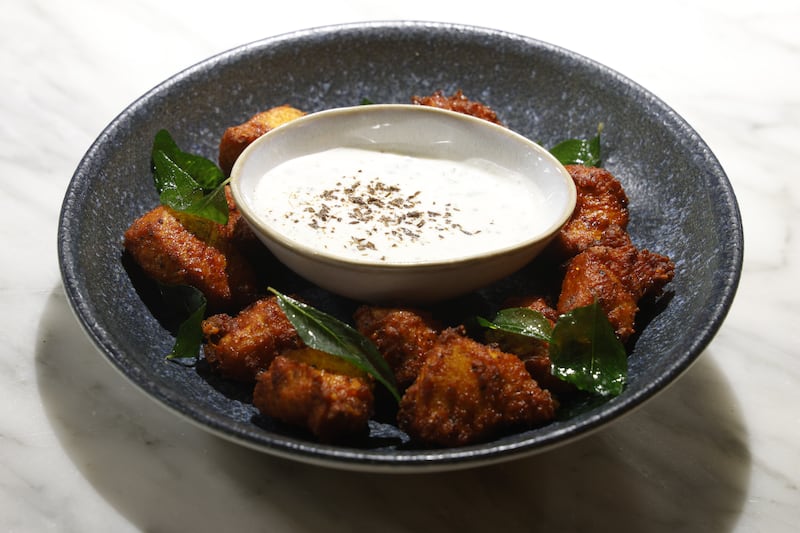 'Chicken 65': spicy marinated fried chicken, ginger and curry leaves with honey cumin yoghurt.  Photograph Nick Bradshaw