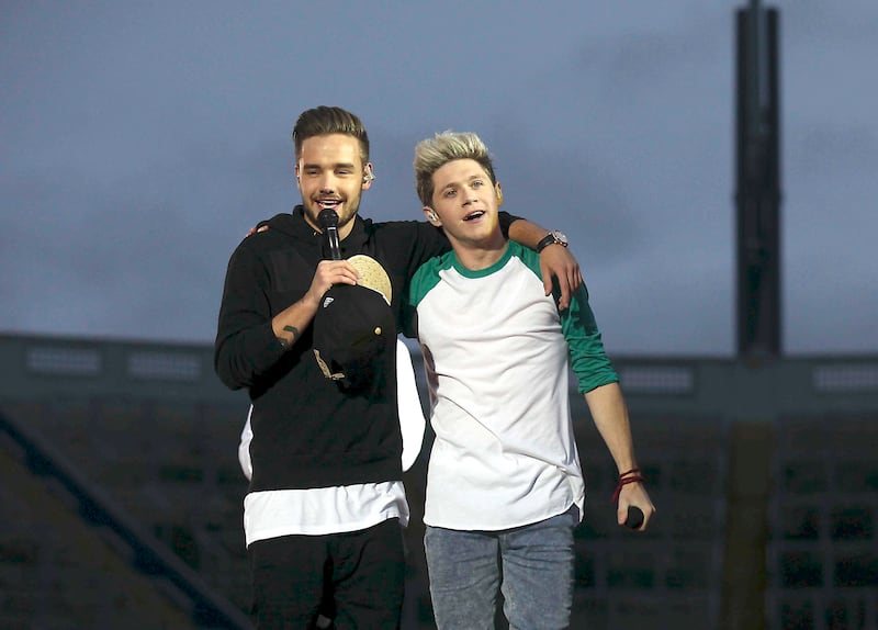 Liam Payne with Niall Horan during a One Direction concert at Croke park in 2014. Photograph: Collins Photos
