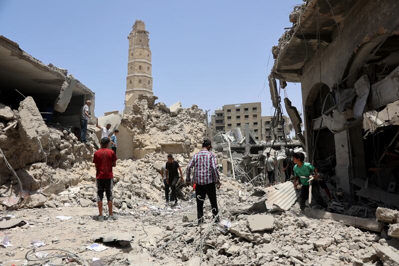 Destroyed buildings following an Israeli bombardment near the Great Omari Mosque in the Old City of Gaza City. Photograph: Omar al-Qattaa/AFP via Getty