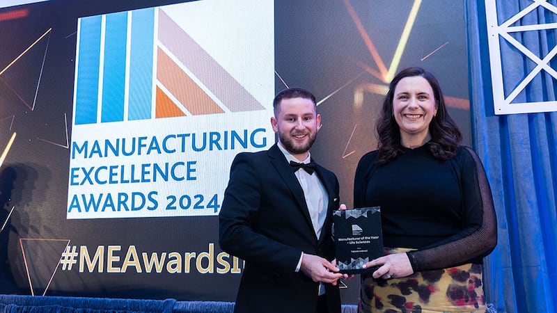 Adam Kane, community lead at Business River presents the manufacturer of the year – life sciences award to Deirdre Connaughton, Takeda Ireland