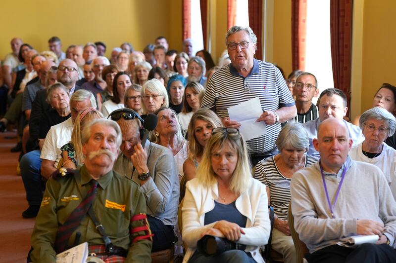 Members of the public speak at a public meeting in Himley near Dudley, regarding the Crooked House pub on August 16th, more than a week after its burnt-out shell was demolished following a suspected arson attack. Photograph: Jacob King/PA Wire 