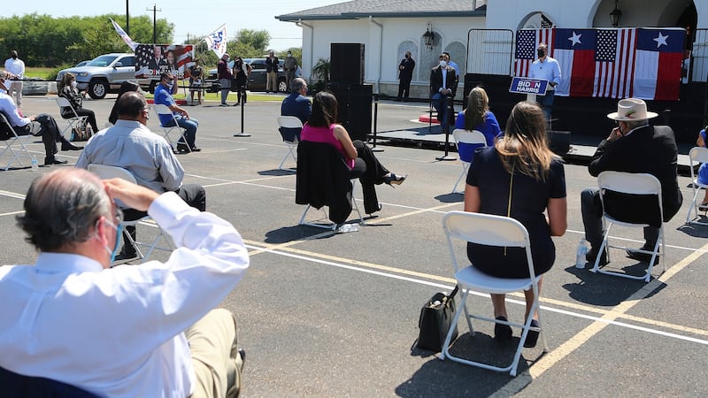 Supporters sit apart as they listen to US vice presidential candidate Kamala Harris’ husband Douglas Emhoff speak  at a Hidalgo County Democratic Party voter registration drive  in Edinburg, Texas. Photograph: Joel Martinez/The Monitor via AP