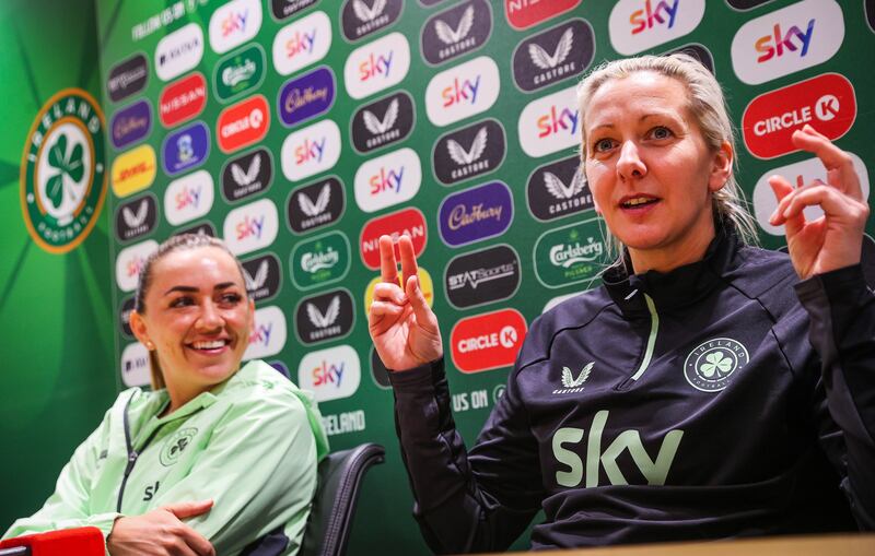 Katie McCabe and head coach Carla Ward. Photograph: Ryan Byrne/Inpho