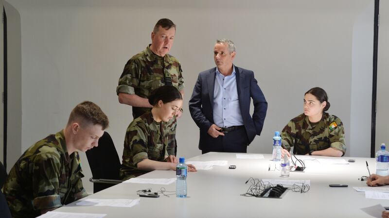 Defence Forces chief of staff Mark Mellett and HSE chief Paul Reid with cadets who were undertaking contact tracing training in March 2020. Photograph: Alan Betson