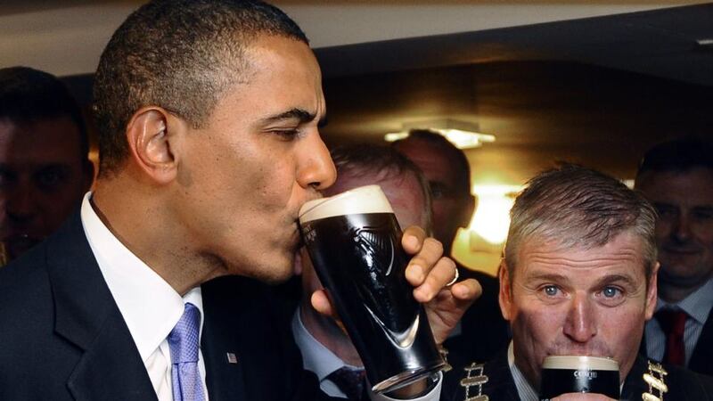 Barack Obama in Ollie Hayes’s pub during his visit to Moneygall in 2011. Photograph: Charles Dharapak/AP Photo