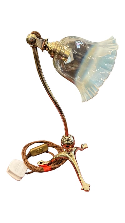 Brass table lamp with opalescent shade, by William Arthur Smith Benson, €750, at Brian Behan's antique gallery