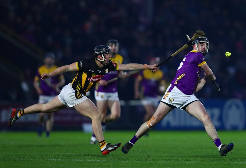 Wexford’s Connal Flood and Kilkenny’s Mikey Butler. Photograph: Ken Sutton/Inpho