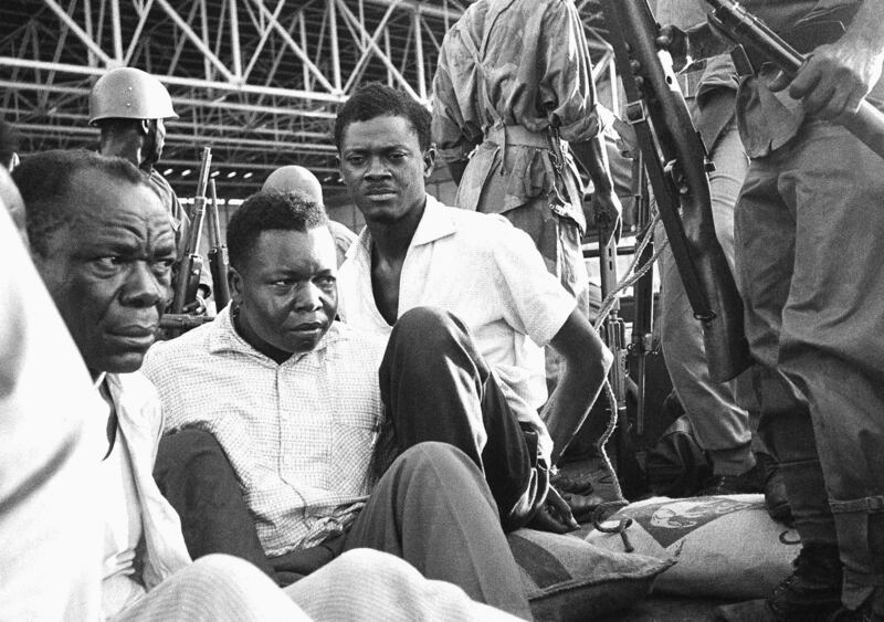 Congo’s former prime minister Patrice Lumumba, centre right, with hands tied behind his back, sits in a truck upon arrival at Leopoldville (now Kinshasa) Airport in Congo, on December 2nd, 1960, following his arrest the previous day. Photograph: AP