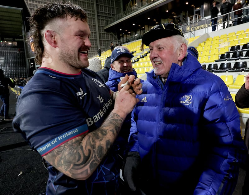 Leinster's Andrew Porter celebrates with his father Ernie after winning his 50th Champions Cup cap in the win against La Rochelle. Photograph: James Crombie/Inpho