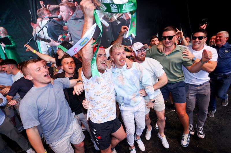 Limerick's players were in jubilant spirits on stage at the TUS Gaelic Grounds. Photograph: Tom Maher/Inpho