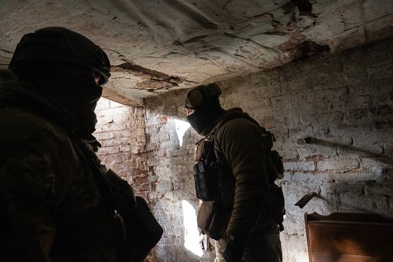 Soldiers with the Free Russia Legion in a bunker near the front line in eastern Ukraine. Photograph: Lynsey Addario/The New York Times