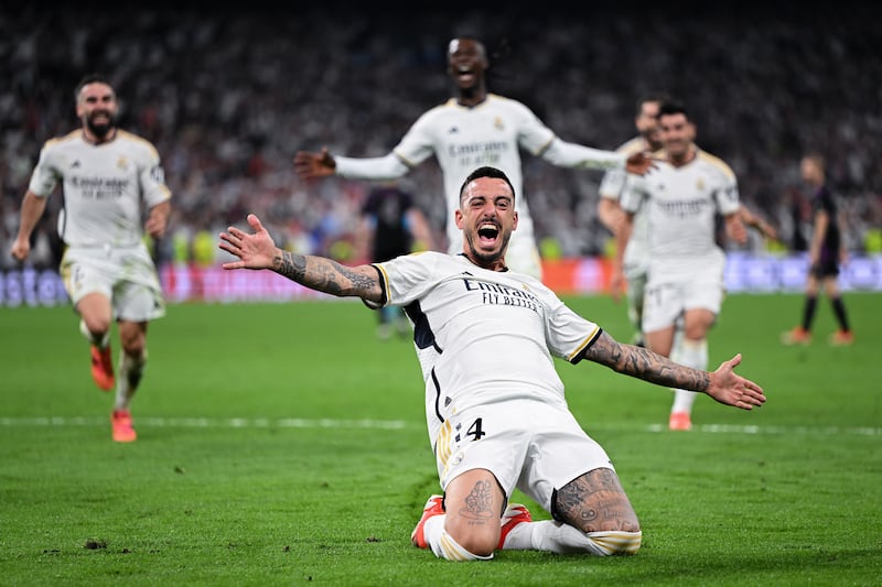 Joselu celebrates scoring his and Real Madrid's  second goal. Photograph: David Ramos/Getty Images