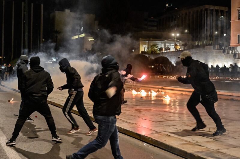 Demonstrators throw molotov cocktails and stones towards police in front of the Greek parliament in Athens on March 3rd following the crash to demand justice for the victims. Photograph: Louisa Gouliamaki/AFP via Getty