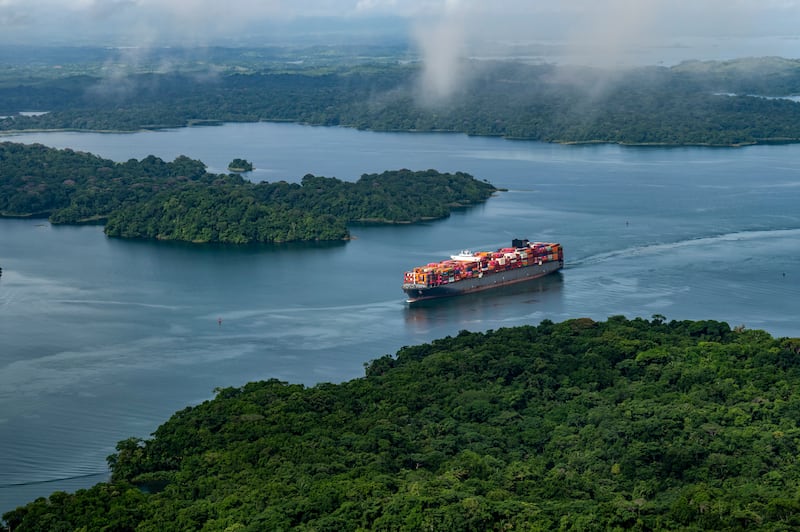 A cargo ship bearing many containers crosses Lake Gatún, the artificial reservoir that is the centerpiece of the Panama Canal system, in Panama on July 10th, 2024. Photograph: Federico Rios/The New York Times
                      