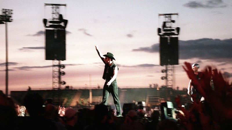 The Edge arrives onstage at Lansdowne Road during U2’s PopMart tour in August 1997. Photograph: Terry Thorp