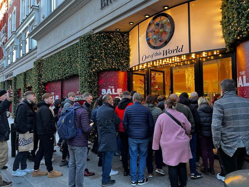 Crowds gather outside Brown Thomas on Grafton Street on St Stephen's Day for the start of the winter sales in 2022. Photograph: Conor Pope