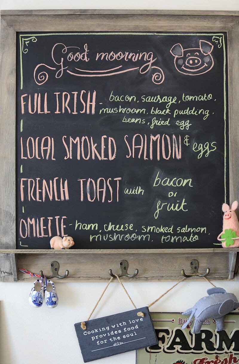 A menu at The Happy Pig. Photograph: Valerie O’Sullivan