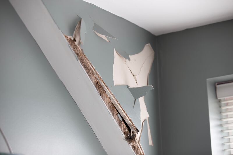 Bathroom wall damage at Nollaig McGreevy's home. Photograph: Brian Farrell