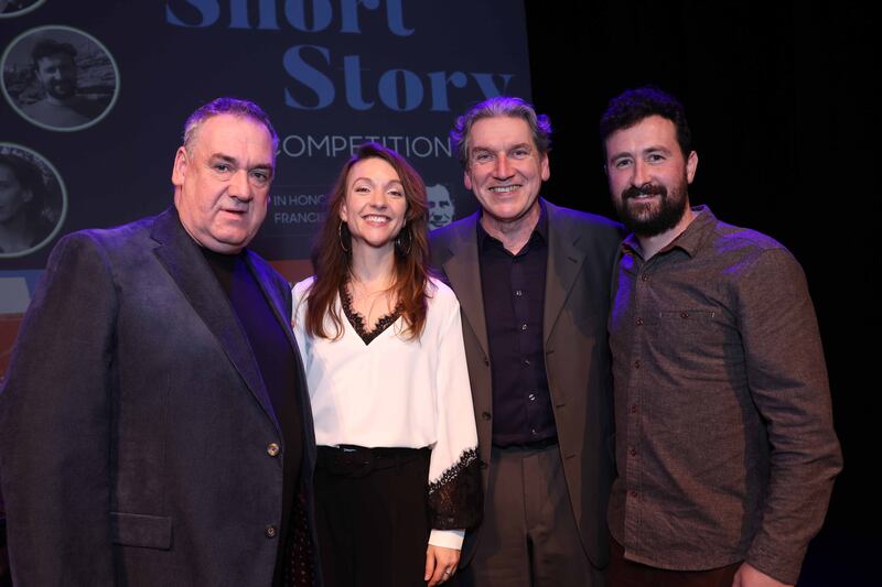 Stephen O’Reilly, who won second prize, Emer O’Toole, who came third, and Sean Rocks, presenter of Arena on RTÉ Radio 1 and host of the RTÉ Short Story Competition awards event, with the winner Mattie Brennan. Photograph: Maxwells