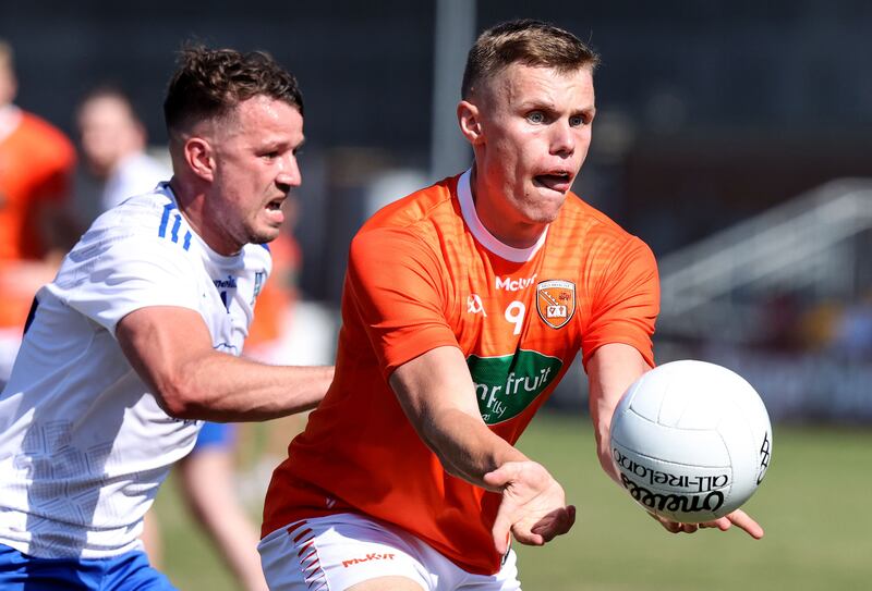  Ryan Wylie of Monaghan and Armagh's Oisín O'Neill. Photograph: John McVitty/Inpho