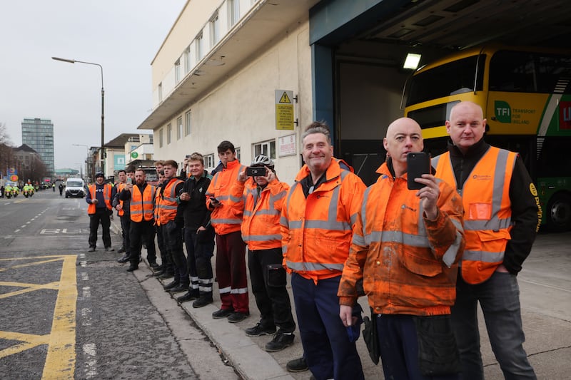  People line the streets as the funeral procession of Shane MacGowan passed down Pearse Street. Photograph: Alan Betson

