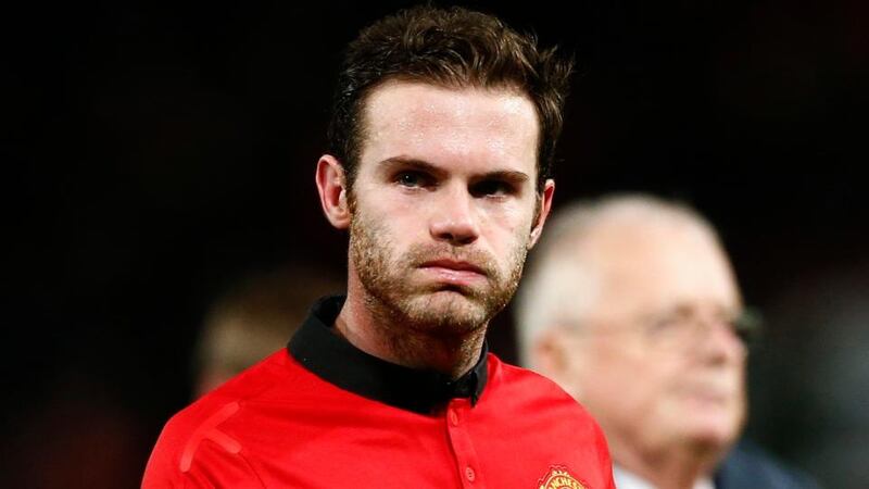 Manchester United’s Juan Mata reacts after the draw. Photograph: Darren Staples/Reuters