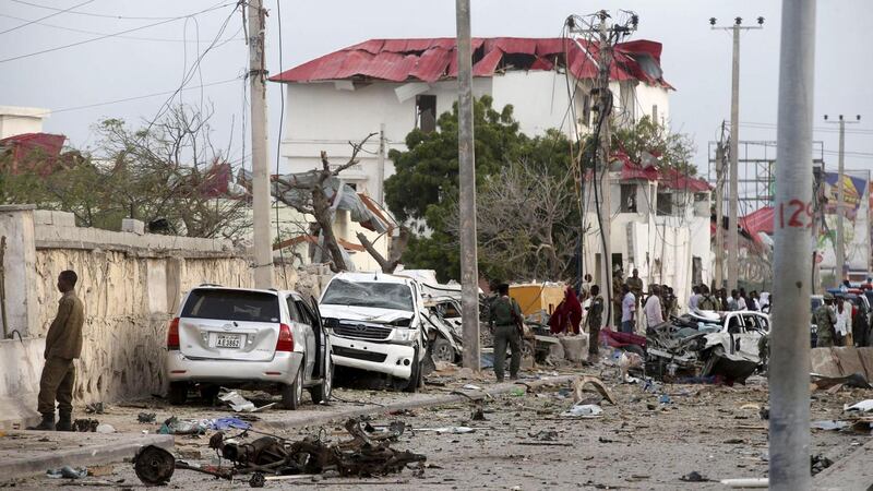 Somali government soldiers stand near the ruins of the Jazeera hotel. Photograph: Feisal Omar/Reuters