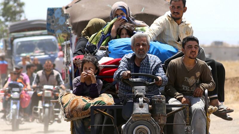 Internally displaced people from Deraa province arrive near the Israeli-occupied Golan Heights in Quneitra, Syria, on June 29th. Photograph:  Alaa Al-Faqir/Reuters