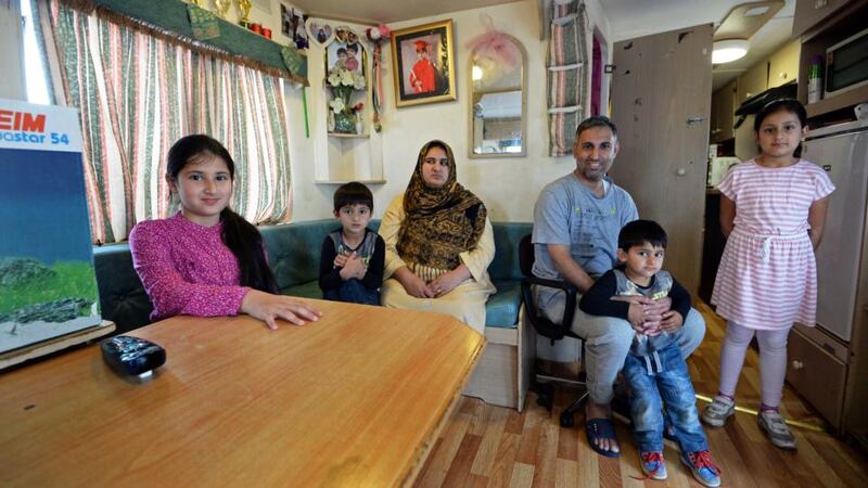 Ahmed Idris and his wife Nazia with their children Alishbah, Aliza, Anas, and Soban, seen in 2016, who grew up living in a caravan at the Athlone Accommodation Centre. Photograph: Eric Luke/The Irish Times