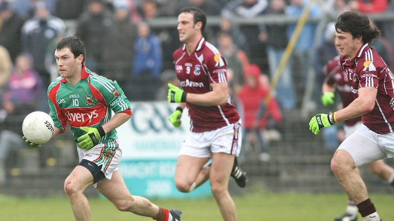 Mark Ronaldson of Mayo is chased by Sean Armstrong of Galway in 2009. Photograph: Mike Shaughnessy/Inpho