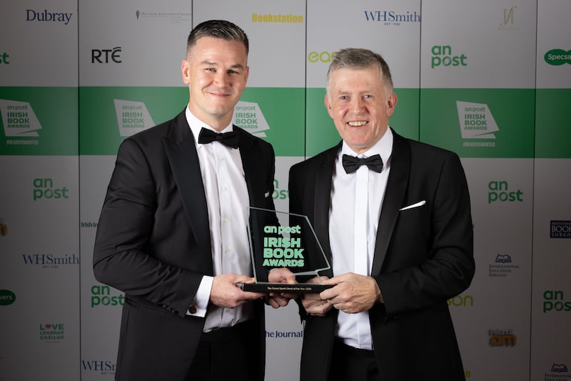 Johnny Sexton and Peter O’Reilly, winners of the Eason Sports Book of the Year for Obsessed: The Autobiography. 