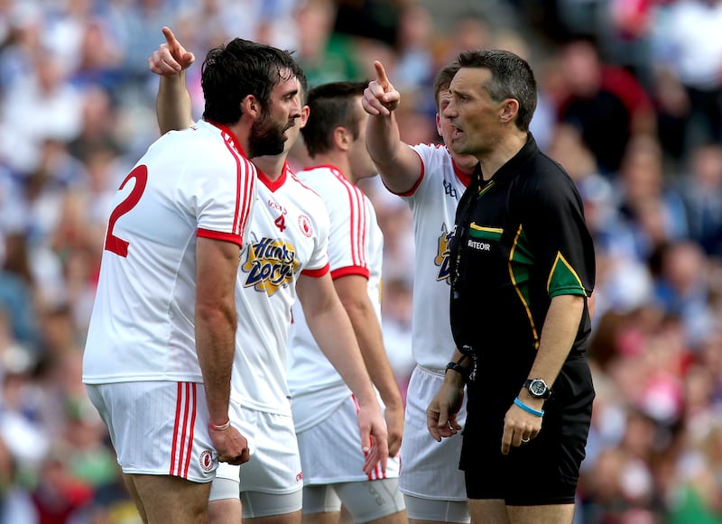 Tyrone players argue with referee Maurice Deegan after he awarded Mayo a penalty in 2013. Photograph: Ryan Byrne/Inpho