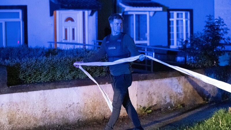 Gardaí seal off the scene near the house in at Whitechapel Grove, Dublin 15, where a man shot two detectives on Tuesday night. Photograph: Colin Keegan/Collins Dublin