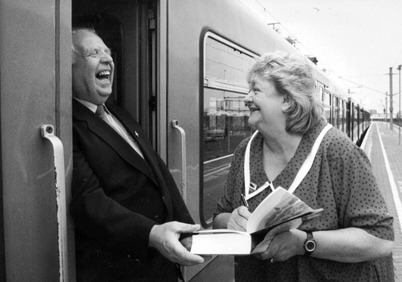 Maeve Binchy is seen chatting to a Dart driver, Michael Flanagan,at Dun Laoghaire station during the launch of her 1994 book, The Glass Lake. Photograph: Pat Langan/The Irish Times