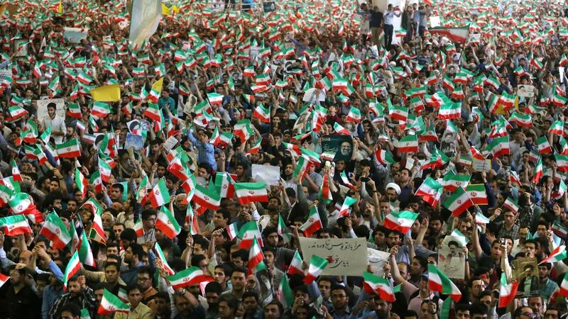 Supporters of the Iranian presidential candidate Ebrahim Raisi attend his campaign rally in Tehran. Photograph: AP