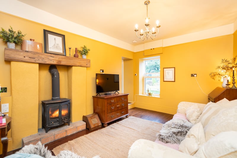 The 'yellow room' is one of three reception rooms in the property