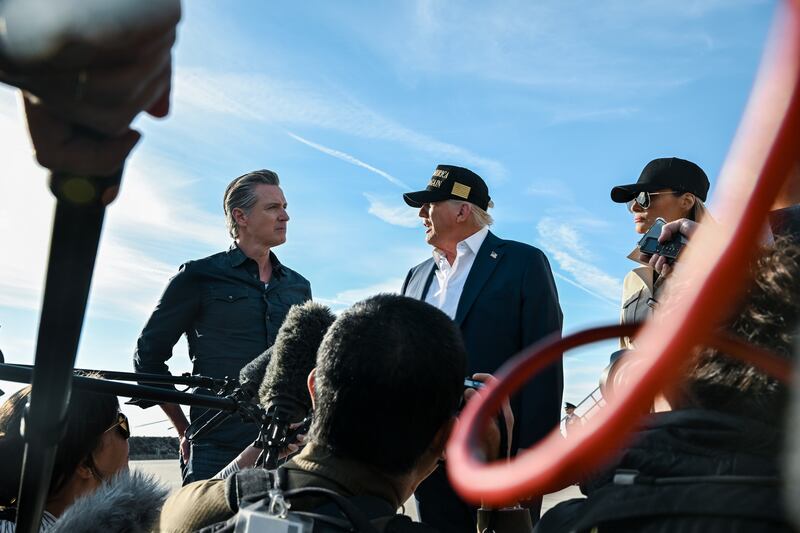 President Trump speaks with California's Democratic governor, Gavin Newsom, at Los Angeles International Airport on January 24th. Photograph: Kenny Holston/The New York Times
                      