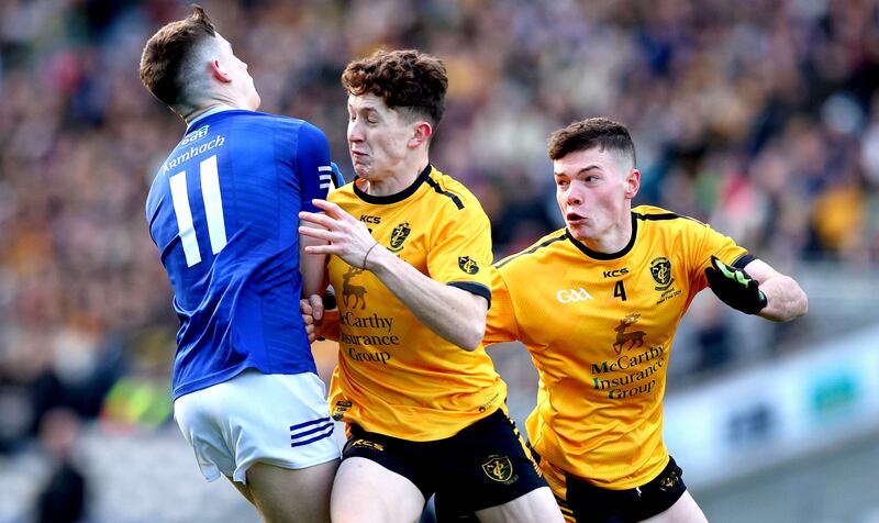 Arva’s Barry Donnelly is tackled by McElligott of Listowel Emmets during the All-Ireland JFC final at Croke Park. Photograph: Ryan Byrne/Inpho