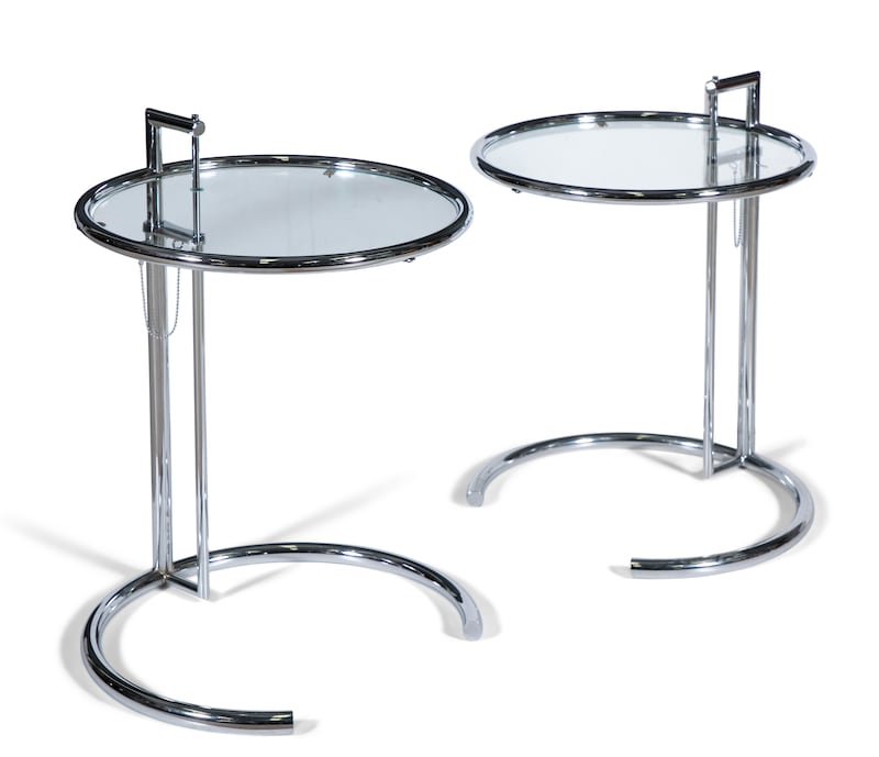 Pair of adjustable chrome E-1027 side tables (€1,500-€2,000) by Eileen Gray