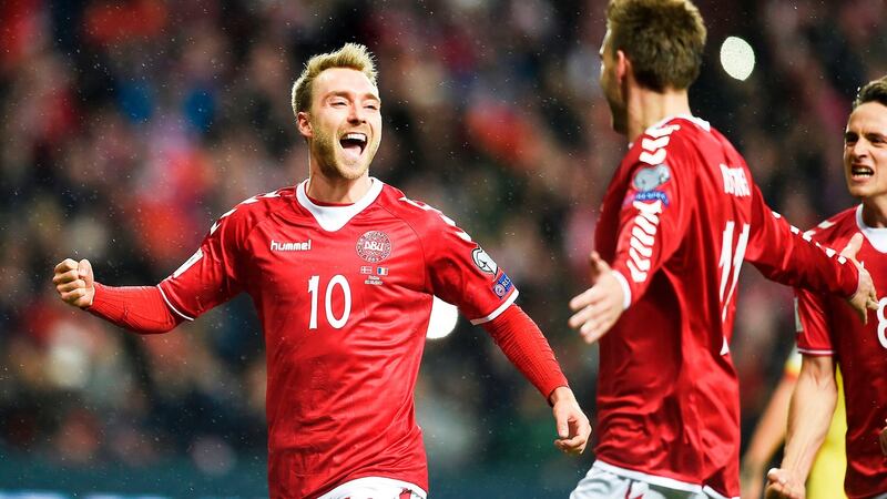 Denmark’s Christian Eriksen  celebrates after scoring a goal during the qualifier against Romania in Copenhagen. Photograph: Liselotte Sabroe/AFP/Getty Images