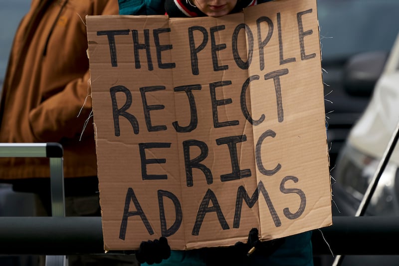 A small group of demonstrators gathered outside the federal courthouse in New York. Photograph: Bing Guan/Bloomberg