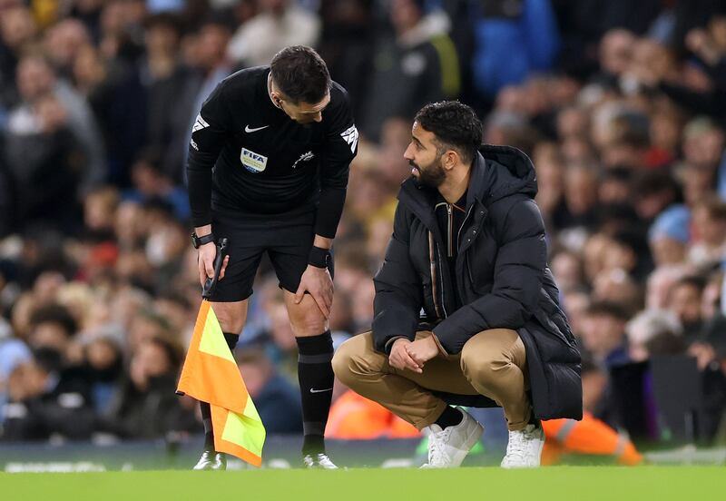 Assistant referee Gary Beswick speaks with Ruben Amorim, manager of Manchester United, during the Manchester derby at the Etihad Stadium. Photograph: Carl Recine/Getty Images