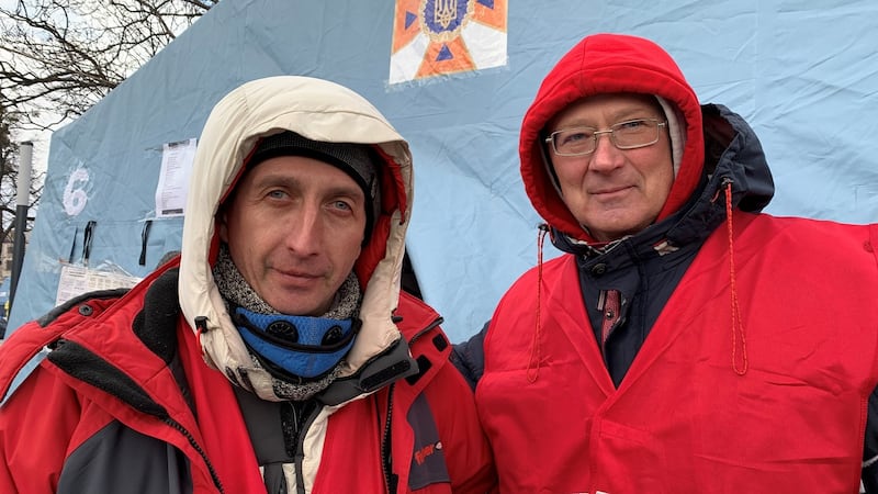 Oleksiy Koshovskyi and Oleh Bazarkin worked together in finance in Kyiv. After sending their families abroad, they  are now refugees and volunteers helping other refugees in Lviv. Photograph: Lara Marlowe