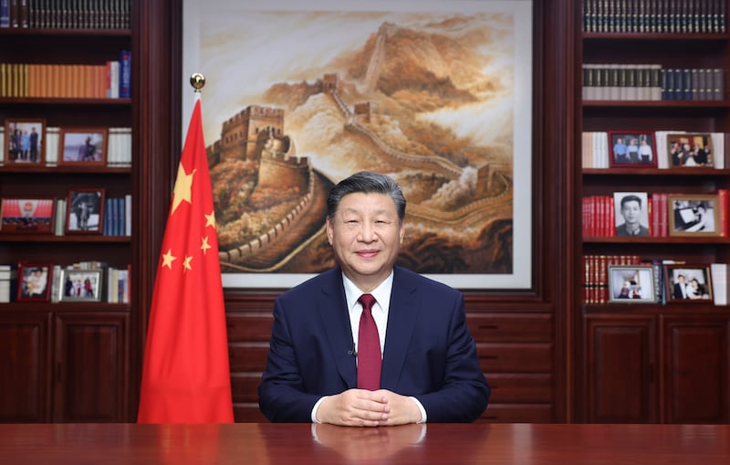 Chinese President Xi Jinping delivering his televised new year address, during which he said that China will ‘surely be reunified’ with Taiwan. Photograph: Ju Peng/Xinhua/AP