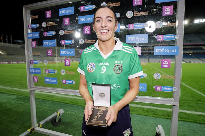 Sarsfields's Niamh McGrath with her All-Ireland senior club final player of the match award at Croke Park. Photograph: Laszlo Geczo/Inpho