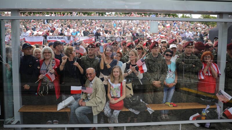 People listen to US president Donald Trump’s  speech at Krasinski Square in Warsaw on Thursday. Photograph: Carlos Barria/Reuters