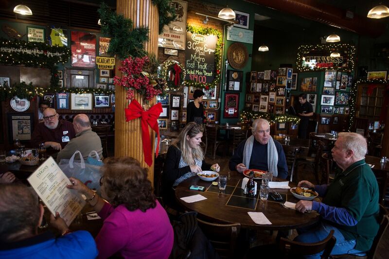 The owners of Coogan’s, from left, Tess McDade, Peter Walsh and Dave Hunt. Photograph: Victor J. Blue/New York Times