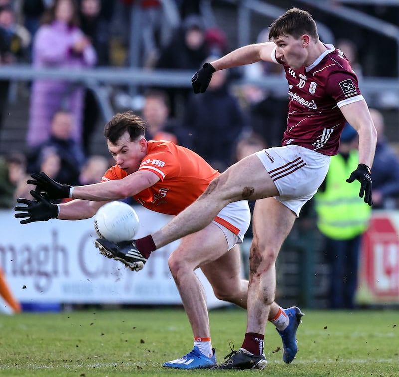 Galway's Matthew Tierney tires to block an effort by Armagh's Barry McCambridge during the All-Ireland Final. Photograph: John McVitty/Inpho