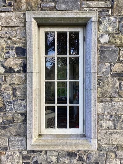 The cut limestone window and door surrounds are based on a design taken from the lodge leading to Castle Durrow in Laois, replicated here in Irish limestone.